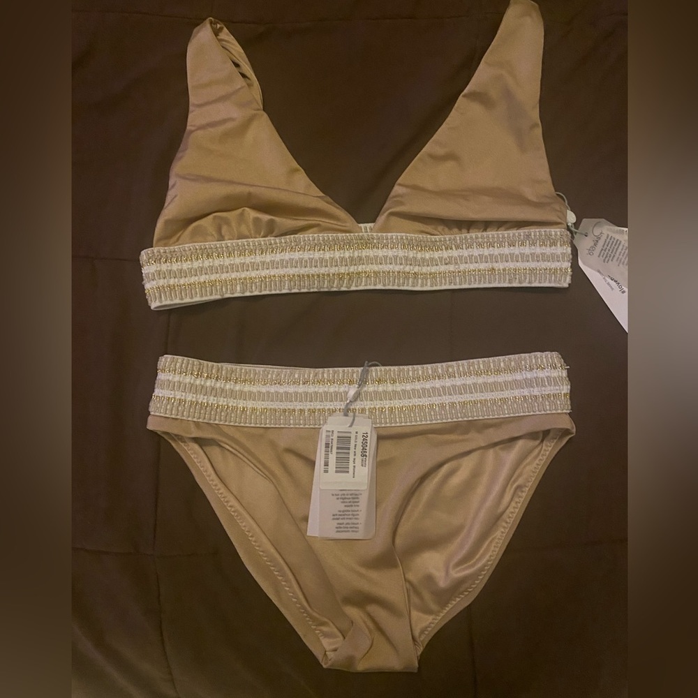 NWT gold swimsuit top is a large, bottoms a medium